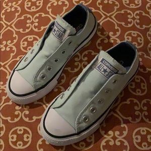 Girls slip on Converse sneakers